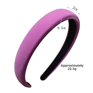 Detail view of purple fabric headband showing 2cm top width and 22.5g weight info