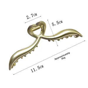 Matte gold heart hair claw clip with detailed size measurements of 11.5cm length and 36g weight
