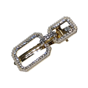 Barrette dorée géométrique élégante avec bordures de perles et strass brillants