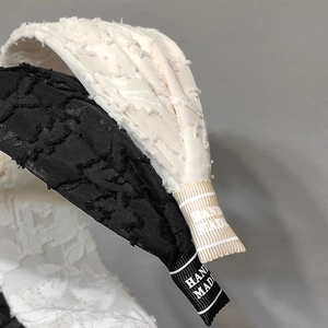 Black and cream retro textured headbands with hand made detail and vintage fringe fabric
