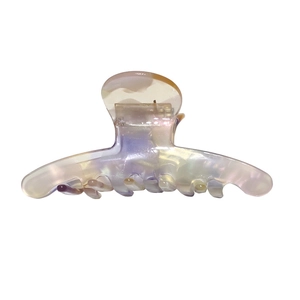 Elegant iridescent acetate shark hair claw clip with colorful pearlescent gradient finish