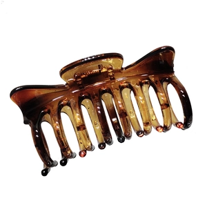Elegant tortoiseshell acrylic hair claw clip with feline ear design for back-of-head styling