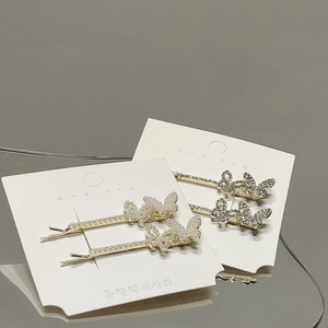 Elegantes Haarspangen-Set mit goldenen Schmetterlingen, Perlen und funkelnden Strasssteinen