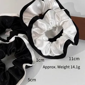 Chouchou satiné de style français en noir et blanc contrasté de 11 cm pour queue de cheval