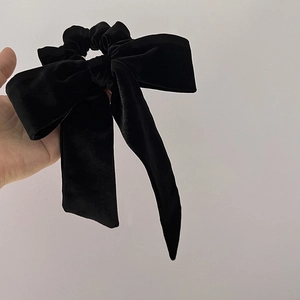 French vintage style large black velvet bow hair scrunchie with layered ribbon detail