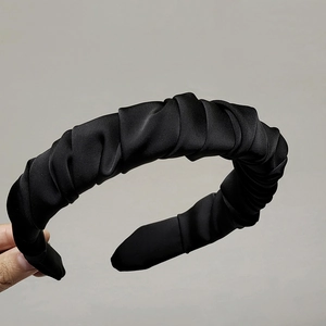 Elegant wide black pleated satin headband featuring a vintage French ruffled fabric texture