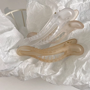Three elegant matte finish French style hair claw clips in white beige and coffee brown colors
