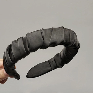 Classic black pleated scrunchie headband with a silky satin texture for women