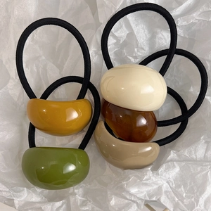 Five-piece set of minimalist French style elastic hair ties in earthy resin tones