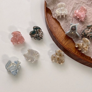 Mini acetate hair claw clips with marble texture pattern in various Morandi colors