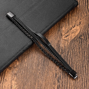 Meerlaagse herenarmband van zwart leer met gevlochten koord en stalen ketting