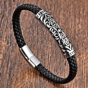 Men's black braided leather bracelet with vintage embossed silver metal and magnetic clasp