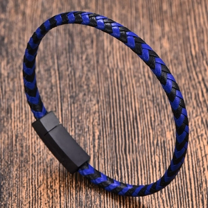 Minimalist blue and black braided leather bracelet with a matte black magnetic clasp