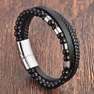 Men's layered black leather bracelet with beaded strands and polished magnetic clasp