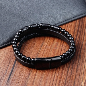 Close-up of black multilayer leather bracelet with obsidian beads and magnetic clasp