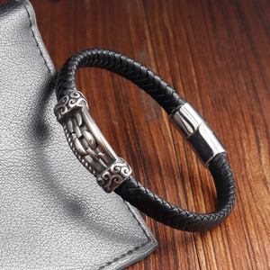 Men's double-layered black woven leather bracelet with vintage silver engraved accents