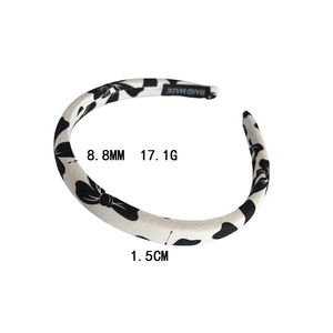 French style black and white polka dot headband with handmade satin finish texture