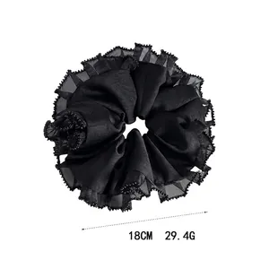 Grand chouchou en organza noir avec bords à volants et micro-perles, diamètre 18 cm