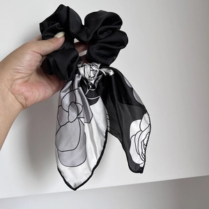 Elegant black satin hair scrunchie with long camellia floral print ribbon streamer
