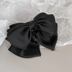Elegant black satin bow hair claw clip with crystal teardrop pendants for women