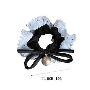 Elegant polka dot lace hair scrunchie with a velvet bow and grey faux pearl pendant
