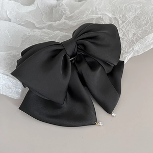 Elegant large black satin bow hair claw with sparkling teardrop crystal pendants