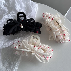 Elegant polka dot chiffon hair claw clips with bows and pearls in black and white