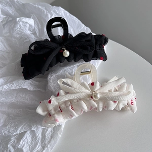 Bow hair claw clips in black and white polka dot chiffon fabric with pearl charms