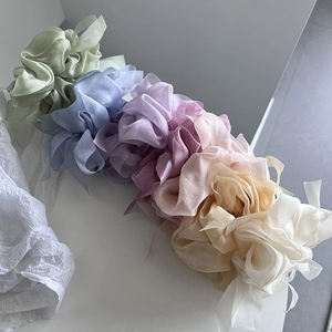 Elegant organza bow scrunchies in pastel macaron colors for women's hair styling