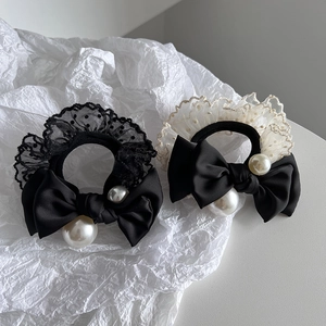 Elegant bow hair ties with lace trim and large pearls shown from a high-quality perspective