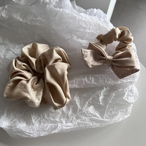 Elegant champagne hair scrunchie set with sparkling rhinestones and a ribbon bow decoration
