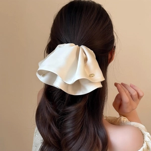 Elegant cream white satin oversized scrunchie with layered ruffles and gold accent