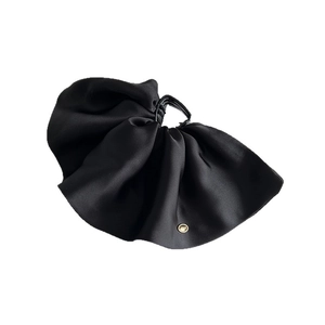 Elegant black satin pleated hair claw clip with gold metallic detail on white background
