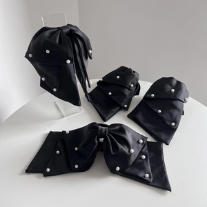 Elegant black satin ribbon hair claws with white pearls and long ribbons for women