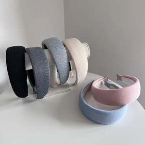 Elegant wide fabric headbands in assorted colors for a high-volume hairstyle look