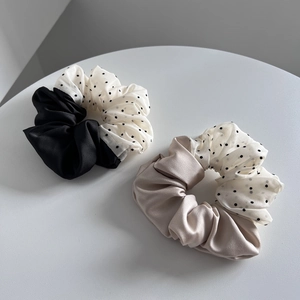 Elegant two-piece scrunchie set with black satin and polka dot mesh textures