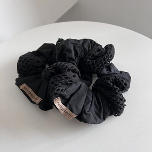Handmade black cotton embroidery scrunchie with hollow mesh splicing and brand label