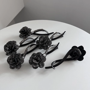 Elegant camellia flower hair clip with sparkling black rhinestones for women