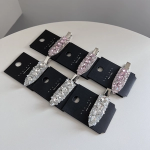 Lot de 6 barrettes à cheveux étincelantes en strass rose et blanc sur présentoir