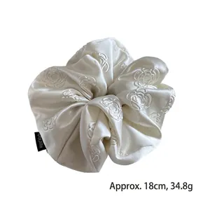 Elegant white satin oversized scrunchie with rose embroidery and 18cm diameter size