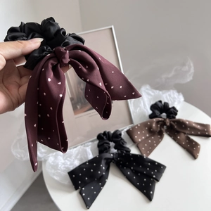 Elegant polka dot bow scrunchies with long ribbons in burgundy, coffee and black colors