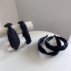 Set of four navy blue polka dot headbands with twist and braided vintage fabric designs
