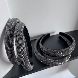 Detail showing high-quality padded headbands with dense rhinestones and anti-slip lining