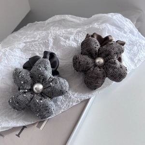 Elegant tweed flower hair ties with pearl centers in dark grey and brown colors