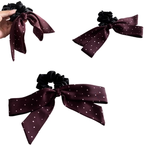 Elegant vintage bow scrunchie with red heart-patterned satin ribbon for hair styling