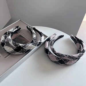 Set of four plaid sponge headbands featuring houndstooth pattern in black and pink fabrics