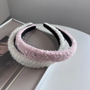 Sparkly sequin knit headbands in white and pink colors for an elegant hair styling look
