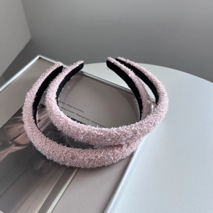 Elegant pink plush headband set with shimmering sequins and soft textured boucle fabric