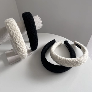 Thick knitted wool headbands in black and cream beige with handmade woven textures