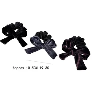 Velvet bow scrunchie set in black blue and purple with soft texture for winter hairstyles